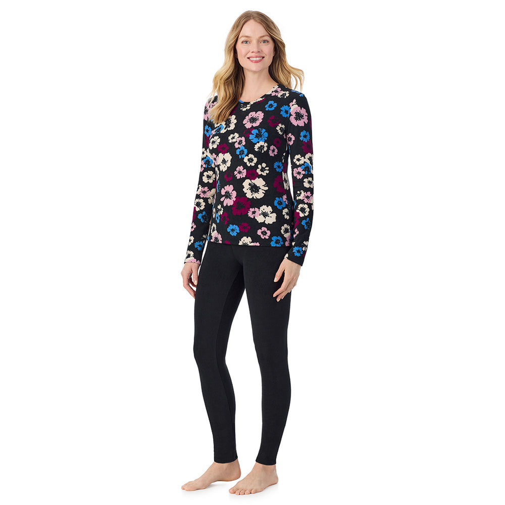 A lady wearing Black Floral long sleeve crew