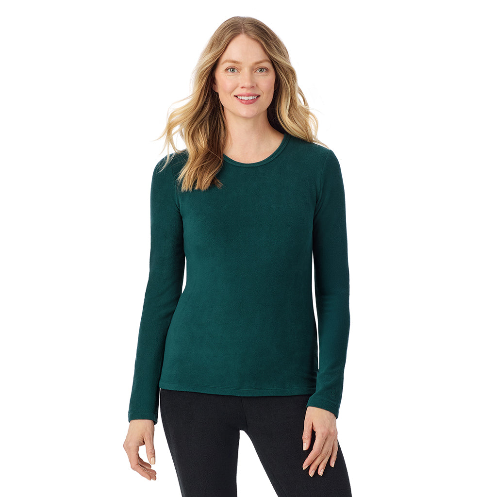 A lady wearing Dark Pine long sleeve crew