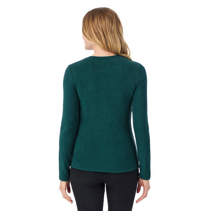 Dark Pine; Model is wearing size S. She is 5'11", Bust 33", Waist 24", Hips 34".@A lady wearing Dark Pine long sleeve crew