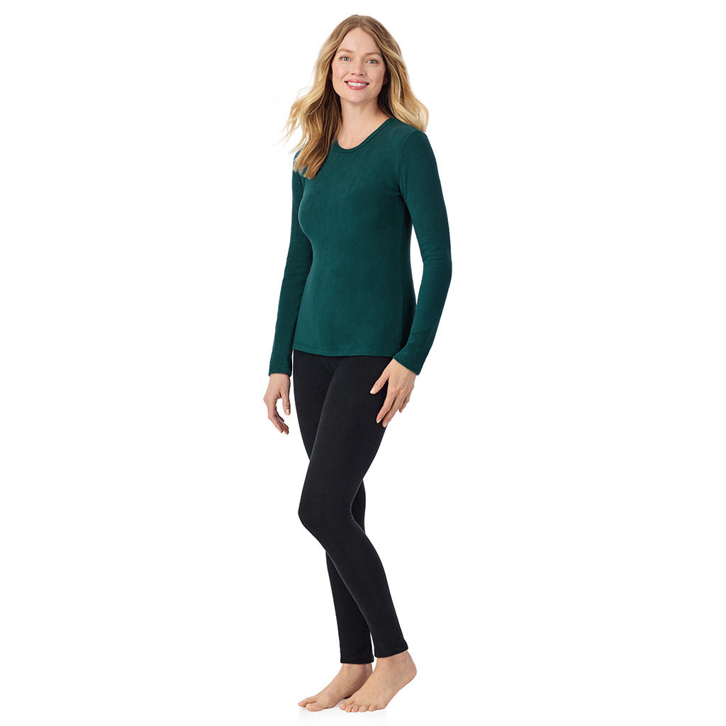 A lady wearing Dark Pine long sleeve crew
