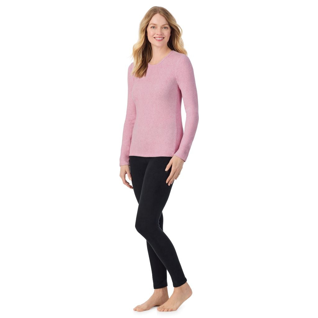 A lady wearing Mauve Mist Heather long sleeve crew