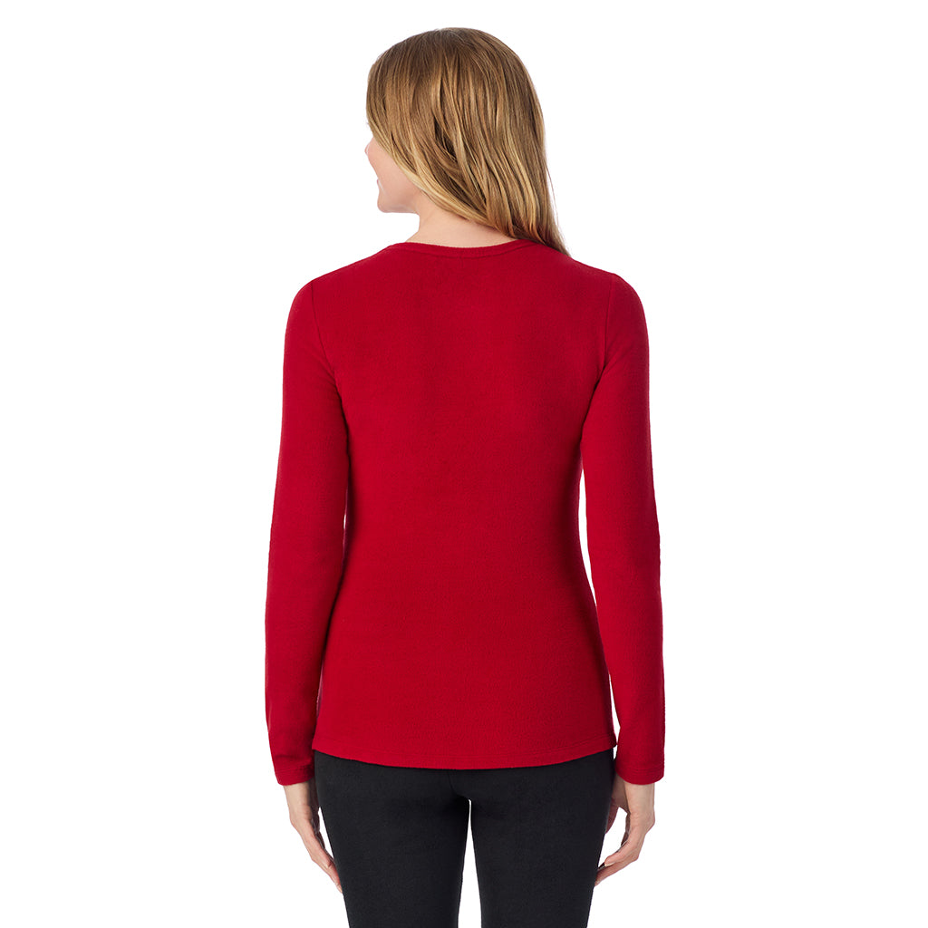 A lady wearing Scarlet long sleeve crew