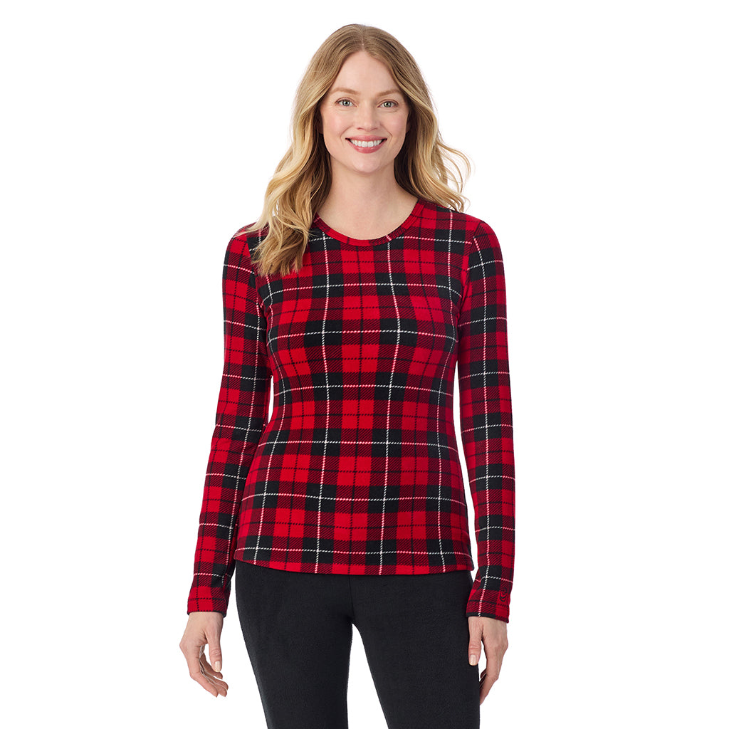 A lady wearing Red/ Black Tartan long sleeve crew