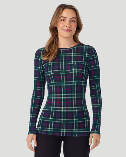 A lady wearing a Blackwatch Plaid long sleeve stretch crew closer look