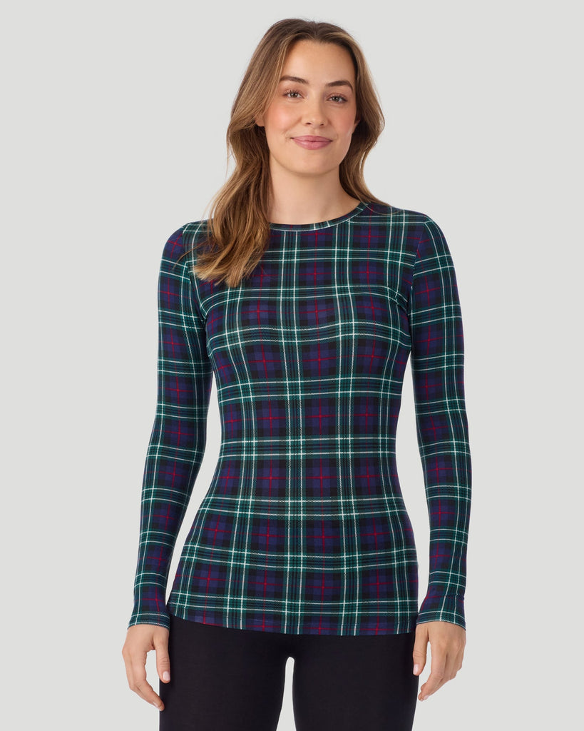 A lady wearing a Blackwatch Plaid long sleeve stretch crew closer look