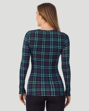 A lady wearing a Blackwatch Plaid long sleeve stretch crew. back view