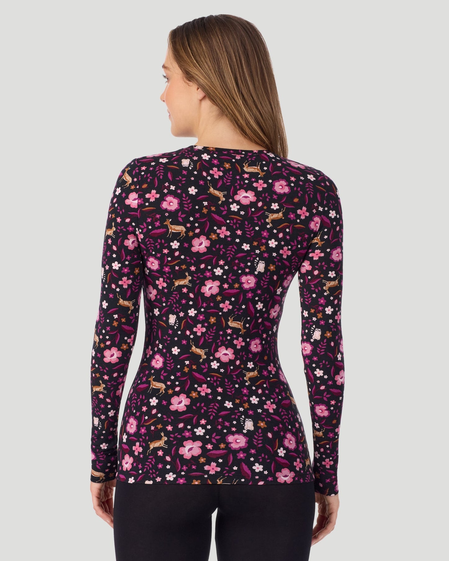 Black Woodland; Model is wearing size S. She is 5'11.5", Bust 34", Waist 26", Hips 37". @A lady wearing a Black Woodland Plaid long sleeve stretch crew back look