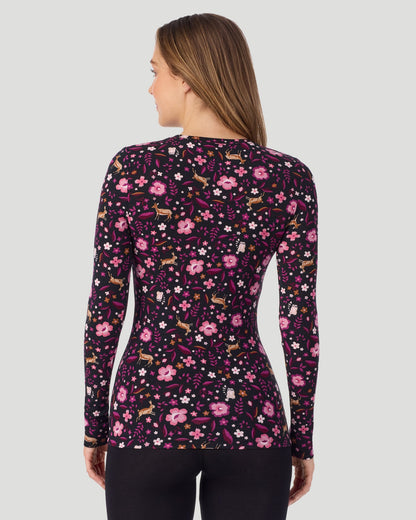 A lady wearing a Black Woodland Plaid long sleeve stretch crew back look