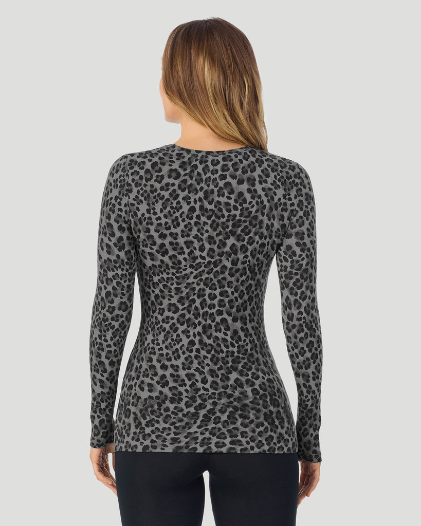 A lady wearing a Charcoal Leopard Plaid long sleeve stretch crew back look