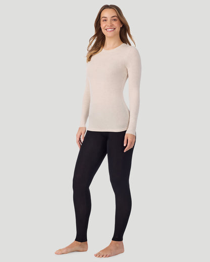 A lady wearing Softwear With Stretch Long Sleeve Crew PETITE in Oatmeal Heather in a front view standing pose