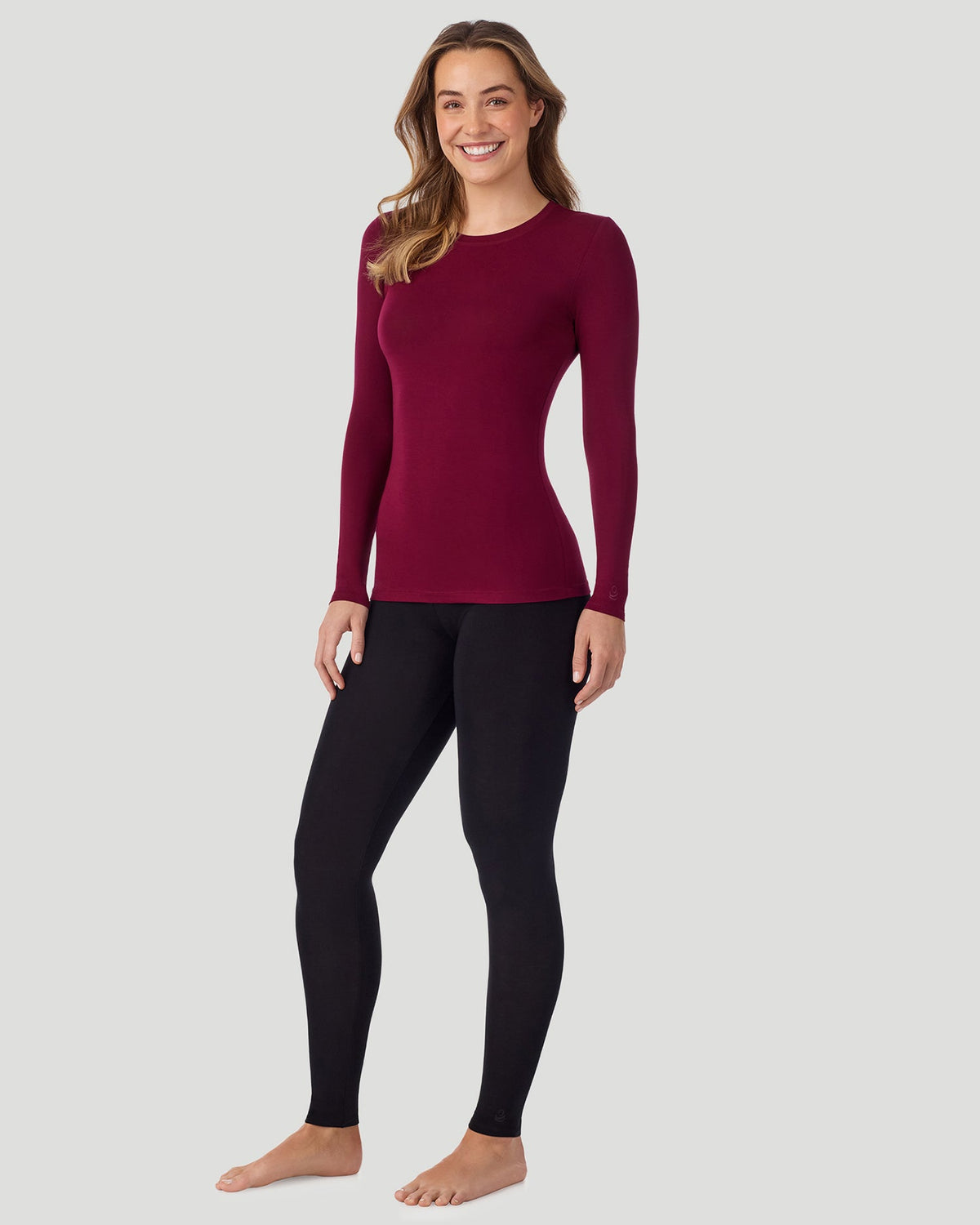 A lady wearing a Bordeaux Plaid long sleeve stretch crew 