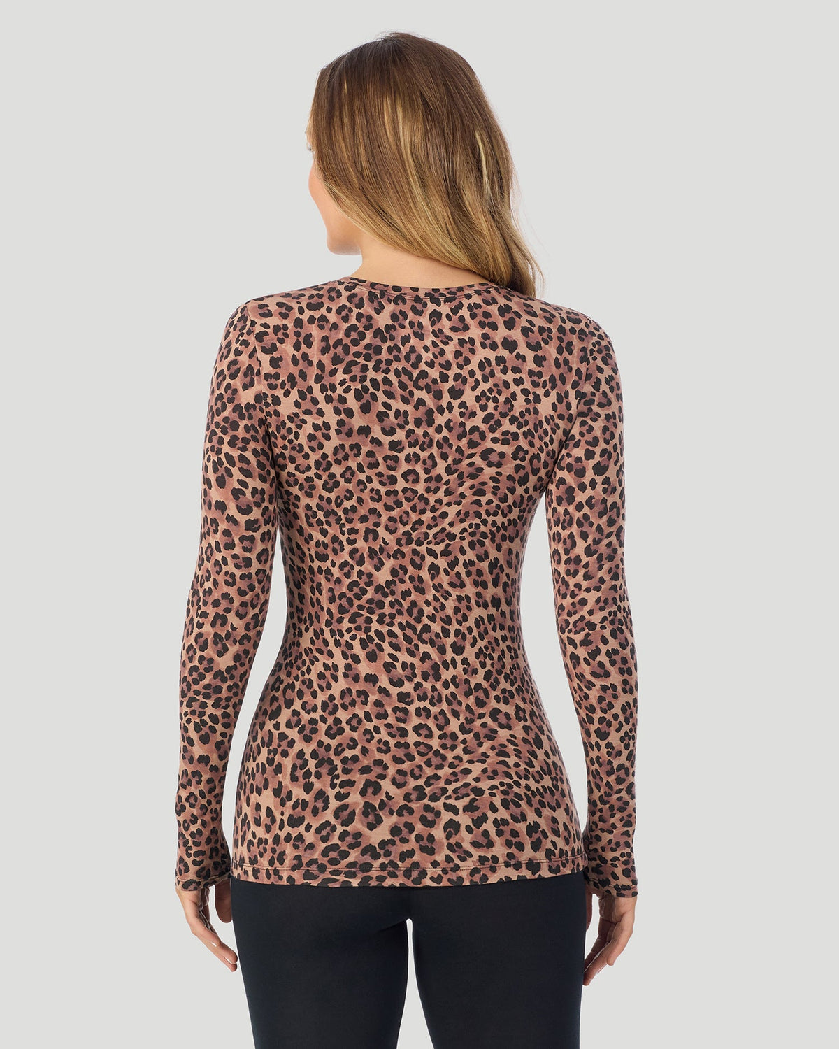 A lady wearing a Taupe Leopard Plaid long sleeve stretch crew back look