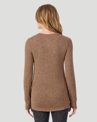  A Lady is wearing Marled Walnut Taupe SoftKnit Long Sleeve Crew in a back view closer look