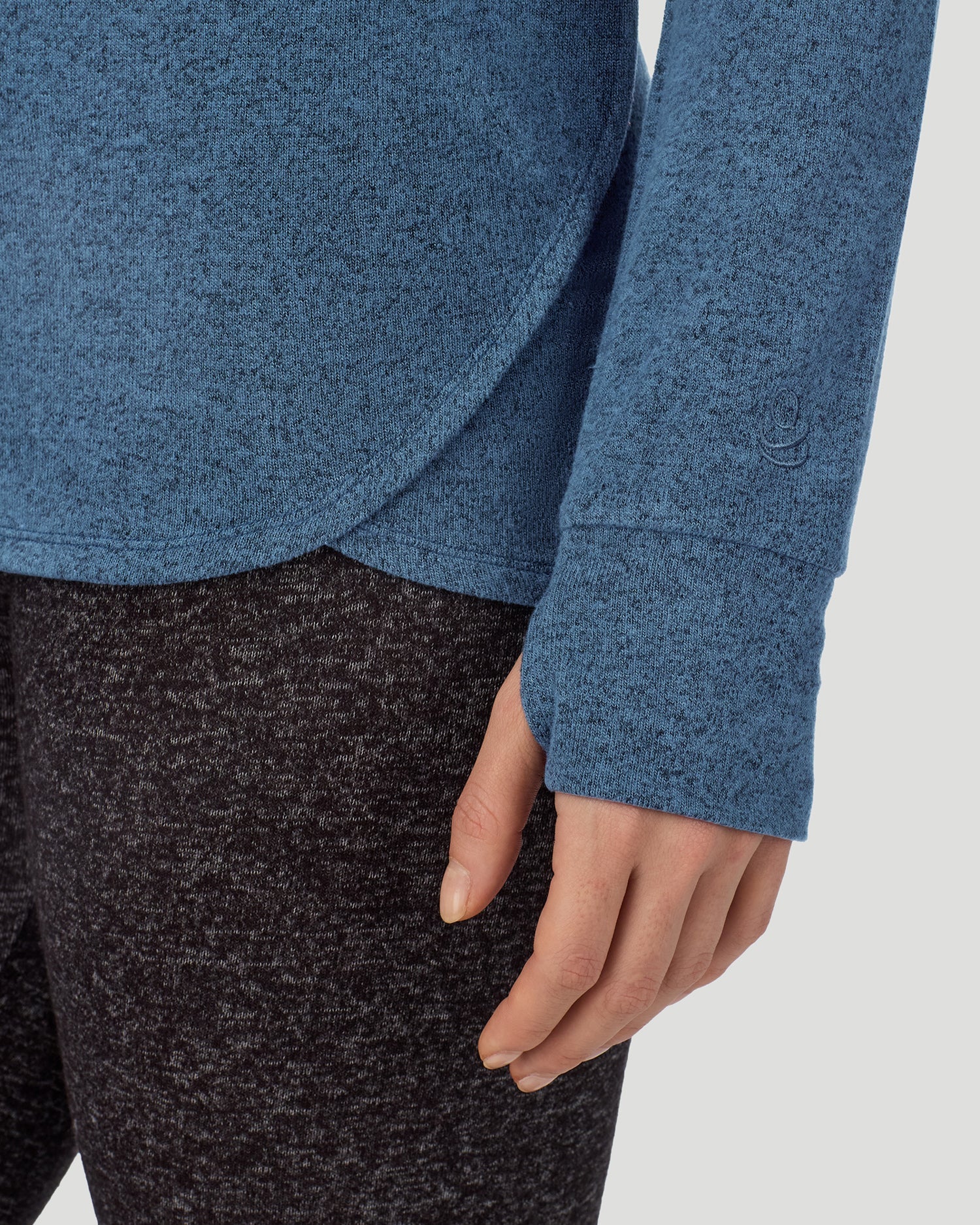  A Lady is wearing Deep Chambray SoftKnit Long Sleeve Crew in a front view detail closer look