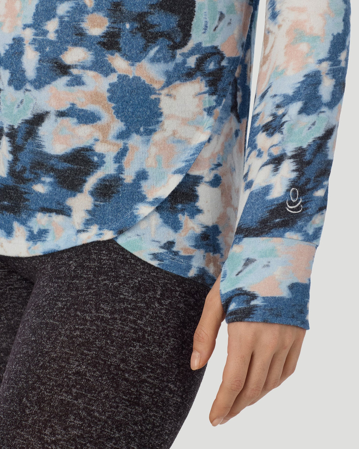 Blue Floral; Model is wearing a size S. She is 5’9.5”, Bust 34”, Waist 25”, Hips 36.5”. @ A Lady is wearing Blue Floral SoftKnit Long Sleeve Crew in a front view detail closer look