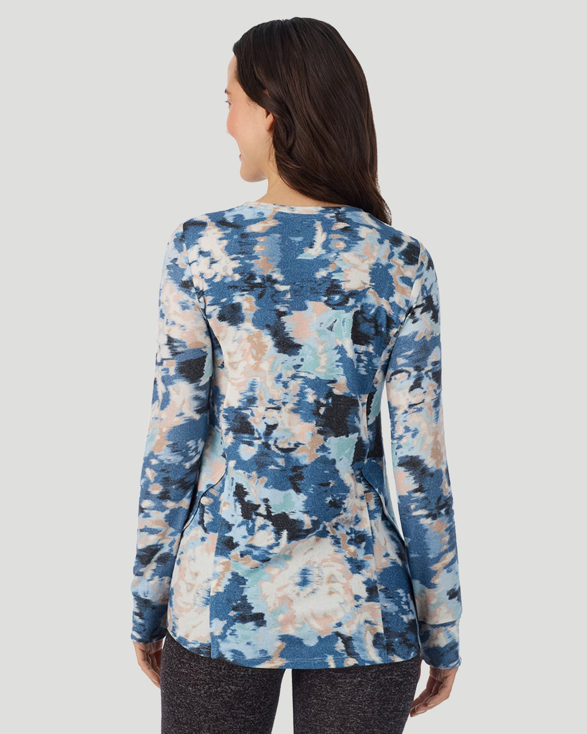  A Lady is wearing Blue Floral SoftKnit Long Sleeve Crew in a back view closer look