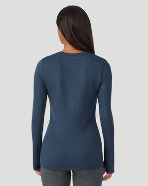  A Lady is wearing Deep Chambray Ultra Cozy Long Sleeve Crew in a back view pose