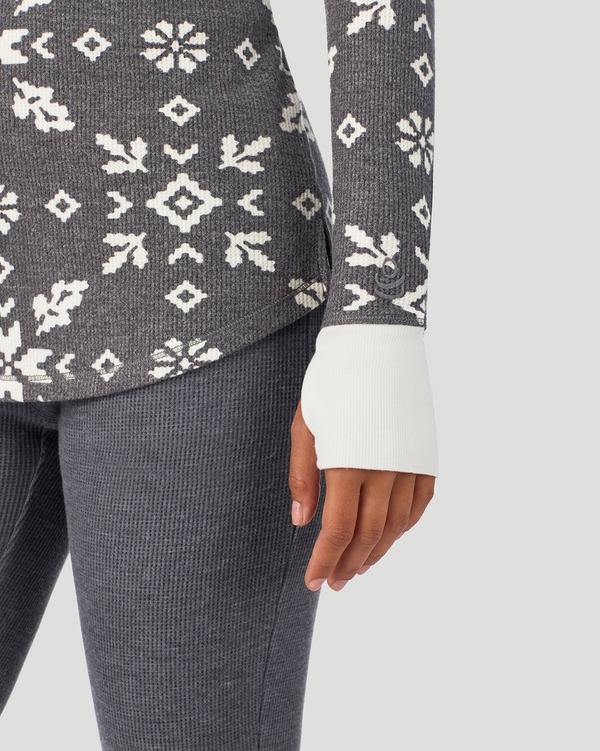 A lady wearing Stone Grey Winter Folk Cozy Stretch Thermal Long Sleeve Crew in a front view detail close up look