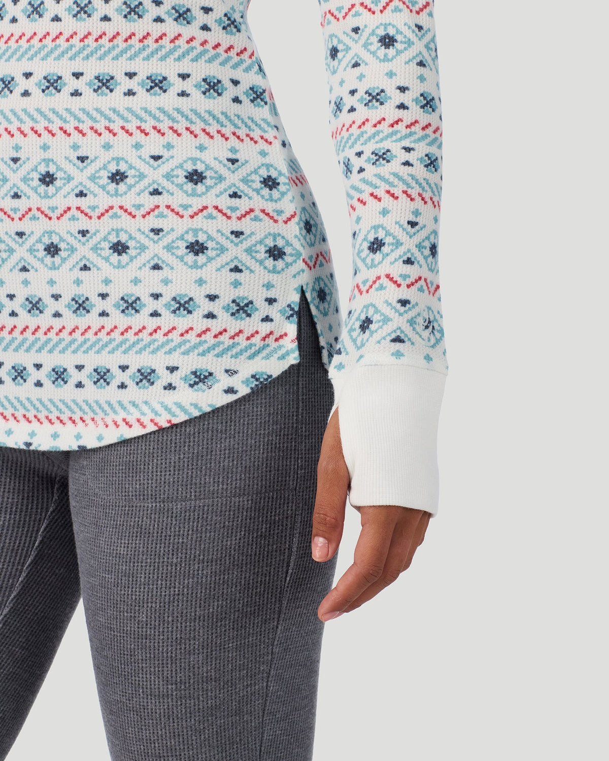 A lady wearing Ivory Blue Fairisle Cozy Stretch Thermal Long Sleeve Crew in a front view detail close up look