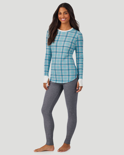 A lady wearing Cadet Blue Plaid Cozy Stretch Thermal Long Sleeve Crew in a front view standing pose