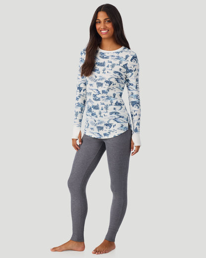 A lady wearing Blue Winter Toile Cozy Stretch Thermal Long Sleeve Crew in a front view standing pose