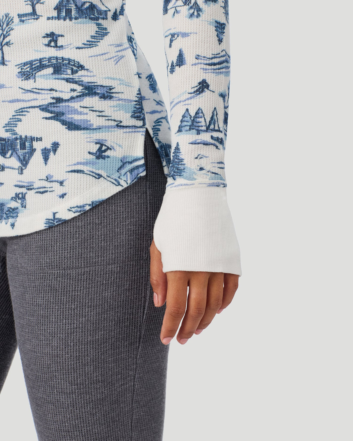 A lady wearing Blue Winter Toile Cozy Stretch Thermal Long Sleeve Crew in a front view detail close up look
