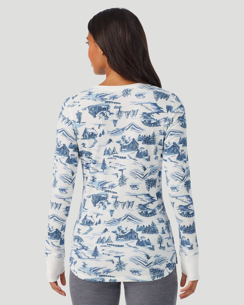A lady wearing Blue Winter Toile Cozy Stretch Thermal Long Sleeve Crew in a back view pose