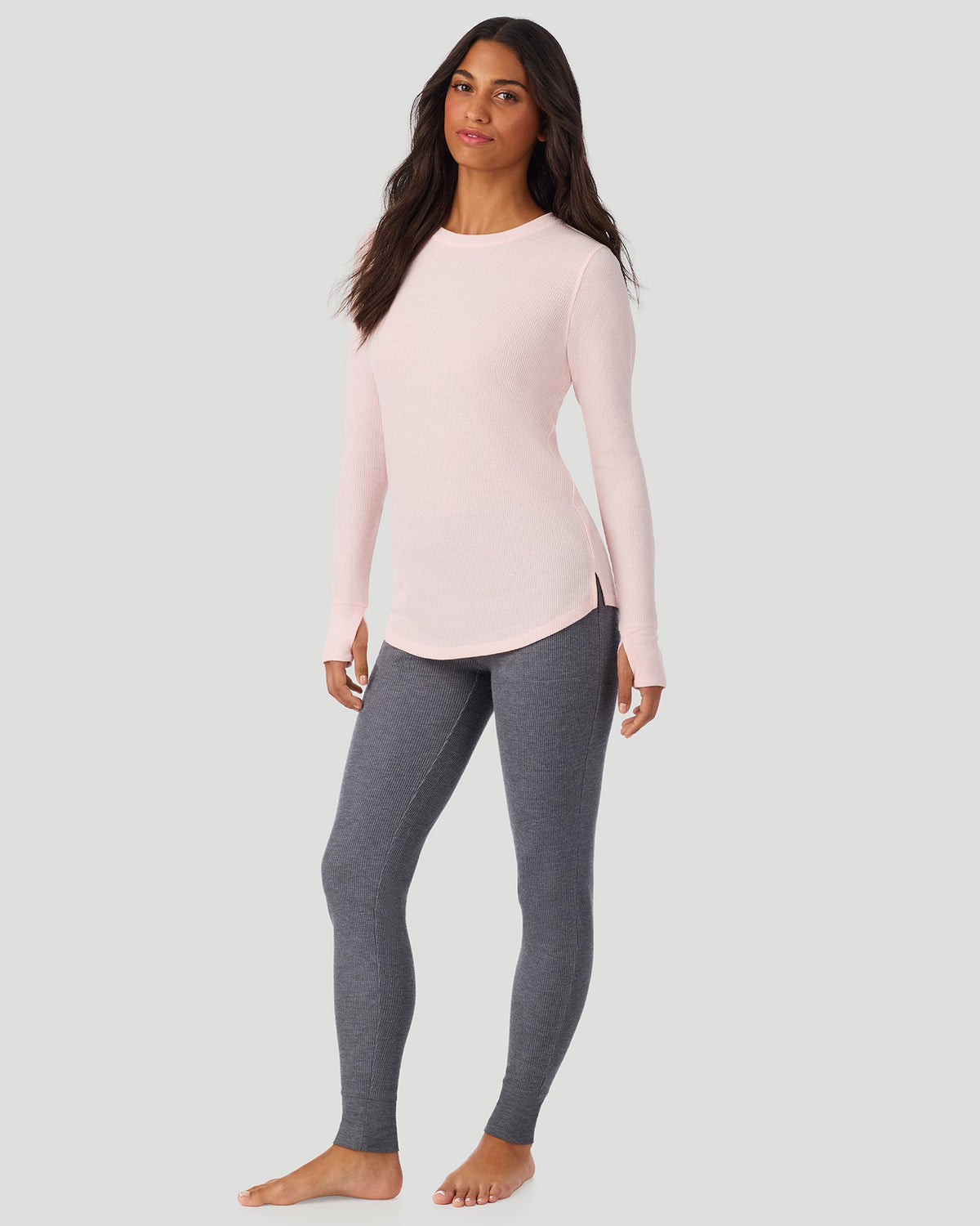 Pretty Rose; Model is wearing a size S. She is 5’7”, Bust 32”, Waist 25”, Hips 34”. @A lady wearing Pretty Rose Cozy Stretch Thermal Long Sleeve Crew in a front view standing pose