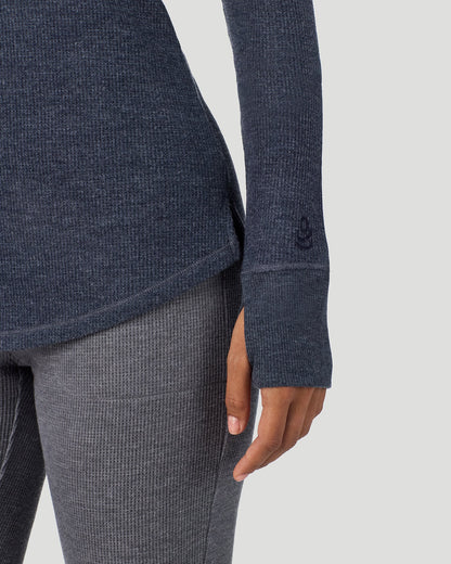 A lady wearing Medieval Blue Heather Cozy Stretch Thermal Long Sleeve Crew in a front view detail close up look