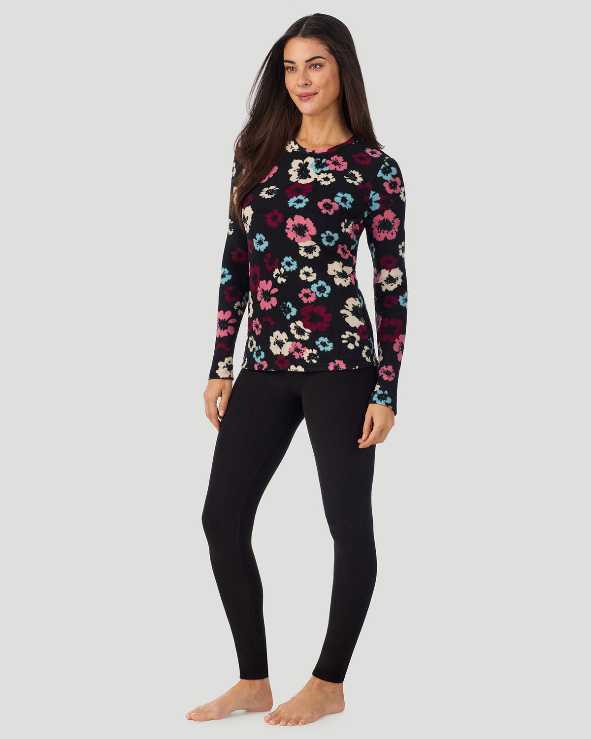 A lady wearing Black Oatmeal Floral Fleecewear with Stretch Long Sleeve Crew in a front view standing pose