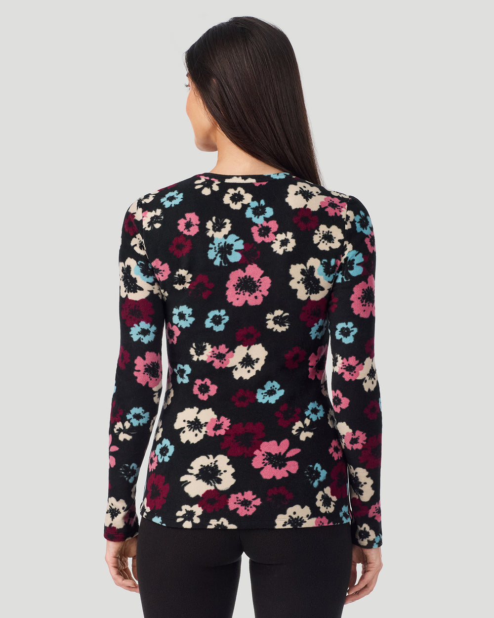A lady wearing Black Oatmeal Floral Fleecewear with Stretch Long Sleeve Crew in a back view pose