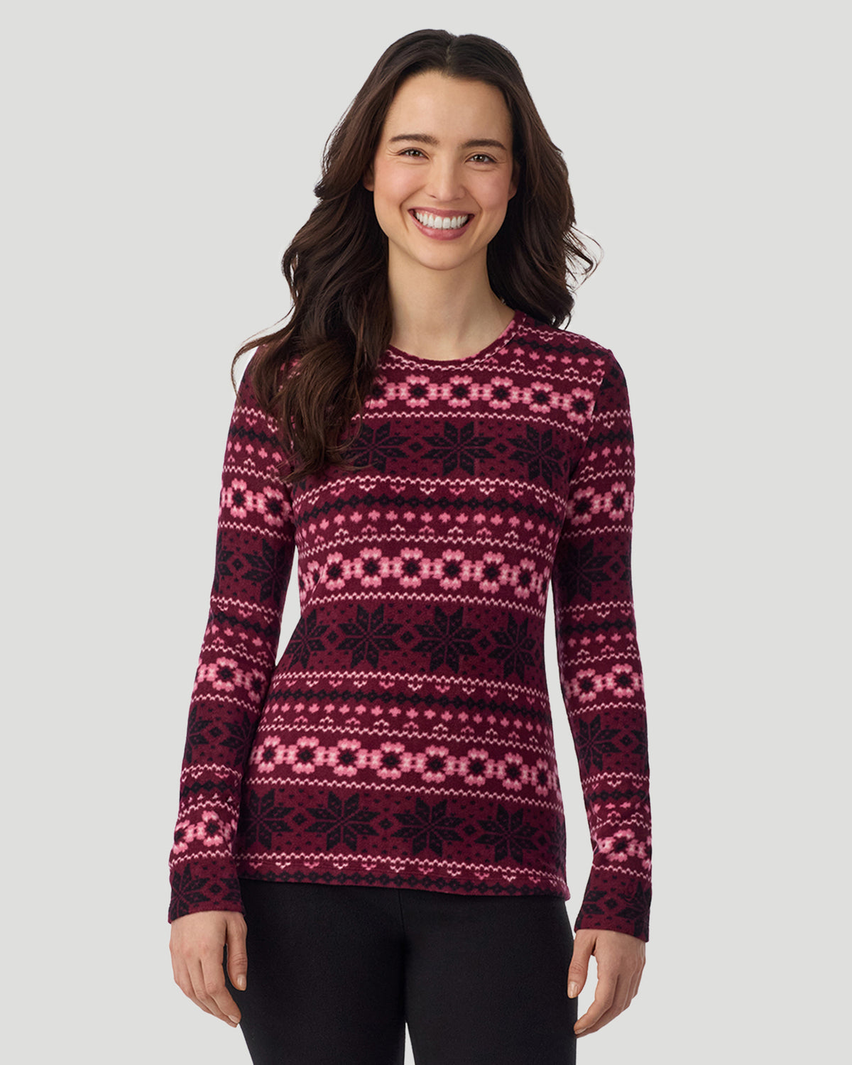 A lady wearing Bordeaux Fairisle Fleecewear with Stretch Long Sleeve Crew in a front view closer look