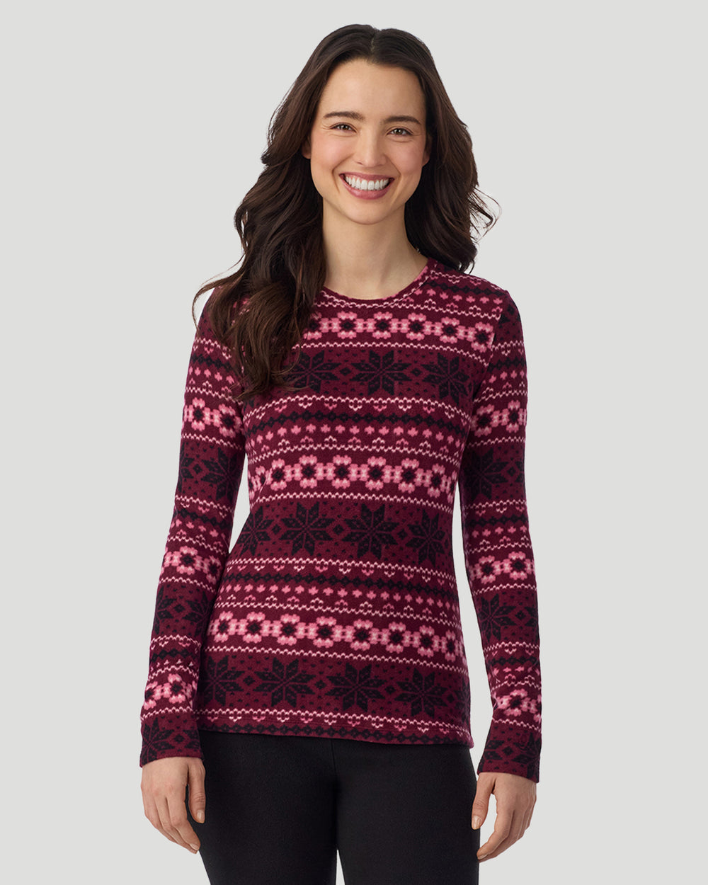 A lady wearing Bordeaux Fairisle Fleecewear with Stretch Long Sleeve Crew in a front view closer look