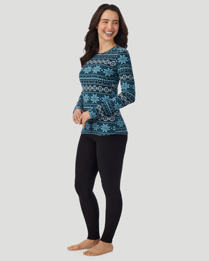 A lady wearing Emerald Fairisle Fleecewear with Stretch Long Sleeve Crew in a front view standing pose