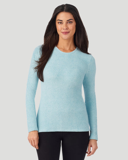 A lady wearing Cadet Blue Heather Fleecewear with Stretch Long Sleeve Crew in a front view closer look