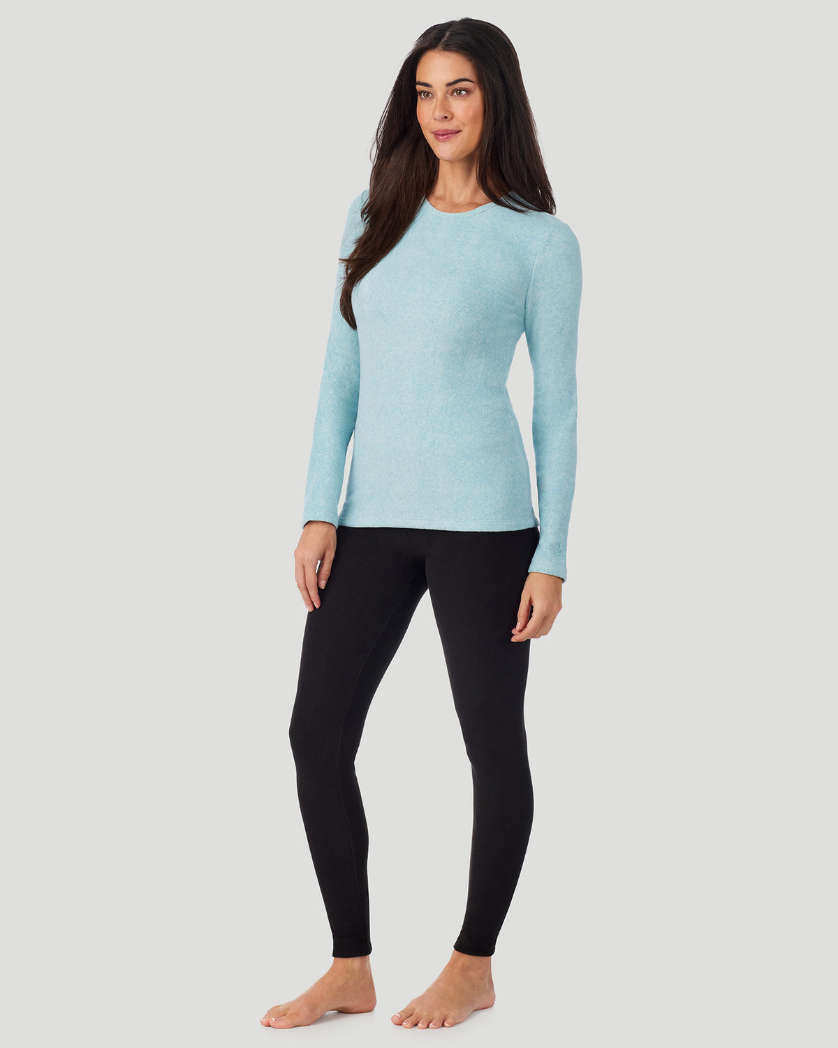 Cadet Blue Heather; Model is wearing a size S. She is 5’9”, Bust 34.5”, Waist 25”, Hips 36.5”. @A lady wearing Cadet Blue Heather Fleecewear with Stretch Long Sleeve Crew in a front view standing pose