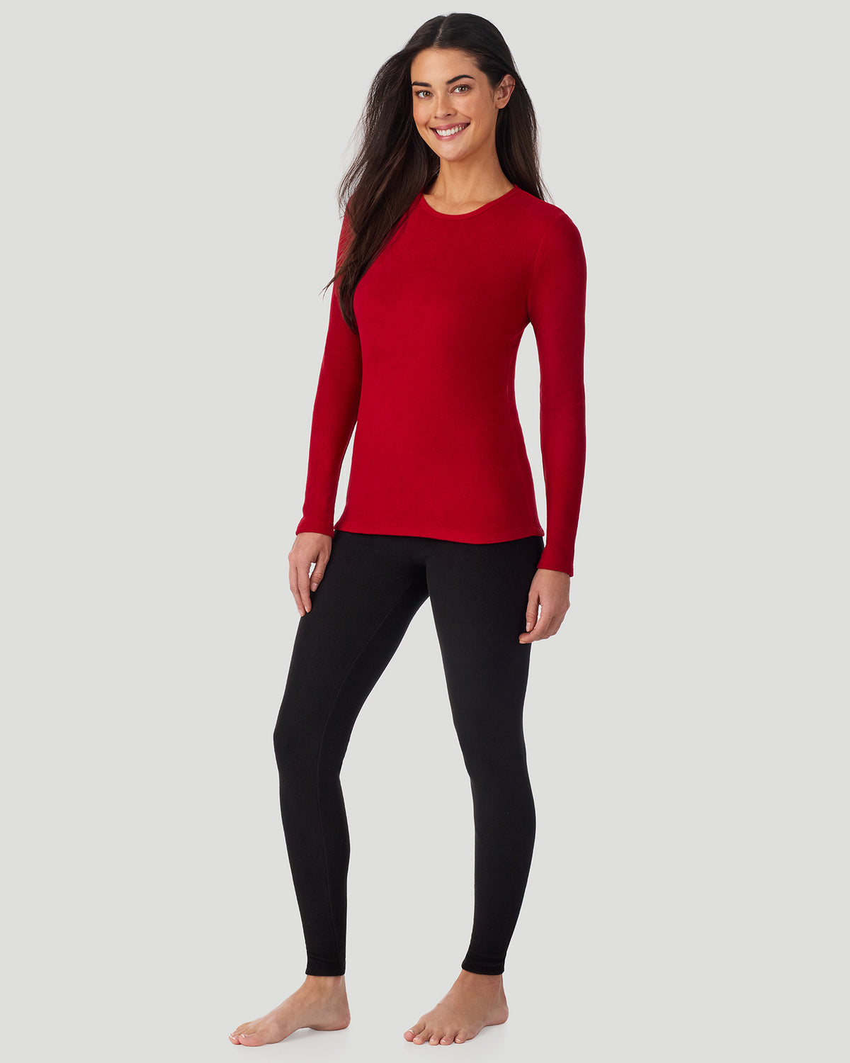 Chili Pepper Red; Model is wearing a size S. She is 5’9”, Bust 34.5”, Waist 25”, Hips 36.5”. @A lady wearing Chili Pepper Red Fleecewear with Stretch Long Sleeve Crew in a front view standing pose