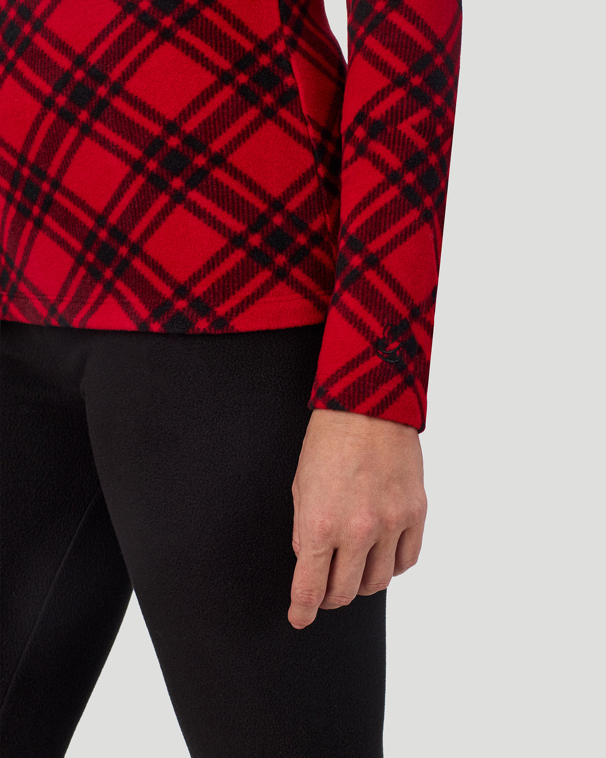 A lady wearing Red White Bias Plaid Fleecewear with Stretch Long Sleeve Crew in a front view detail close up look