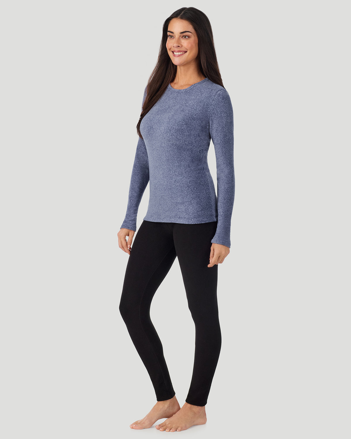 Smoke Blue Heather; Model is wearing a size S. She is 5’9”, Bust 34.5”, Waist 25”, Hips 36.5”. @A lady wearing Red Smoke Blue Heather Fleecewear with Stretch Long Sleeve Crew in a front view side angle pose