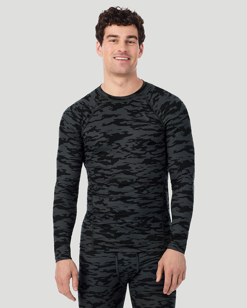 A man wearing Black Print ClimateSport Long Sleeve Crew in a front pose