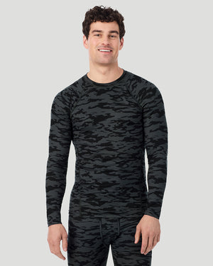 A man wearing Black Print ClimateSport Long Sleeve Crew in a front pose