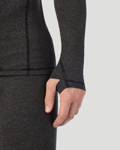  A man wearing Grey Stripe FlexStripe Long Sleeve Crew in a front view detail close up look of the sleeve thumbhole