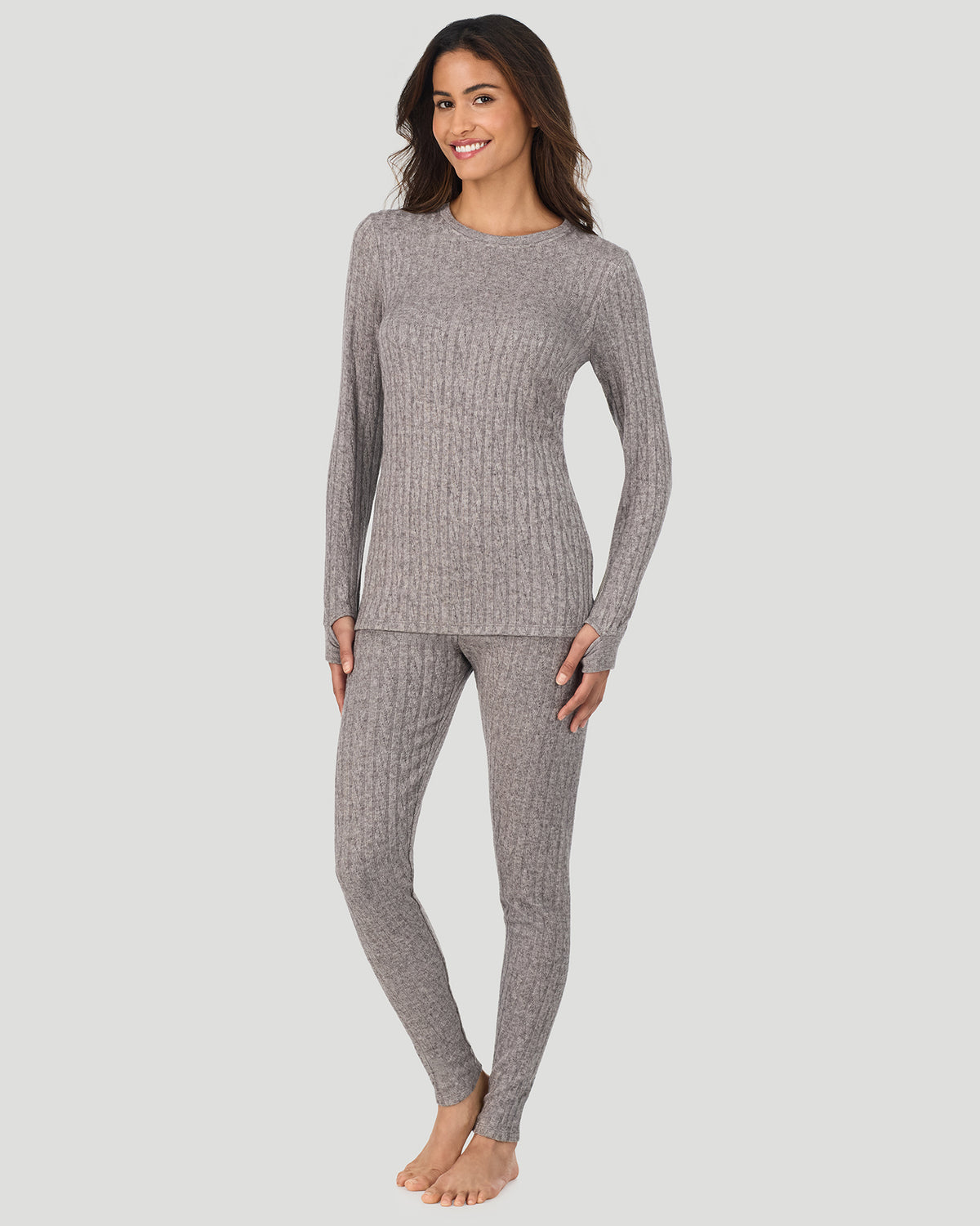 Light Grey Heather; Model is wearing a size S. She is 5’10”, Bust 33.5”, Waist 25”, Hips 36”. @A lady wearing Light Grey Heather Cable Knit Long Sleeve Crew in a front view standing pose