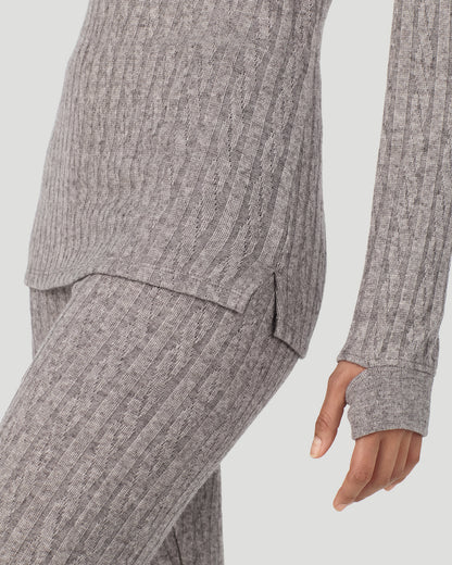 A lady wearing Light Grey Heather Cable Knit Long Sleeve Crew in a front view close up look of the fabric
