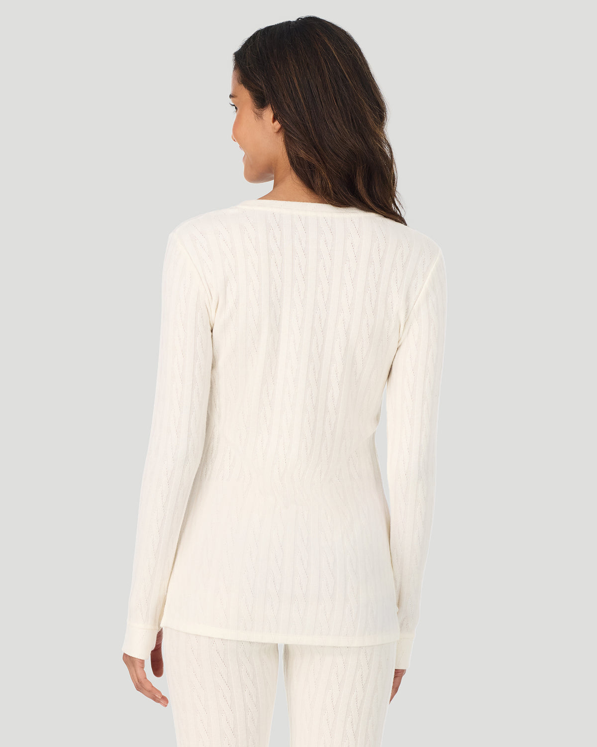 Vanilla Ice; Model is wearing a size S. She is 5’10”, Bust 33.5”, Waist 25”, Hips 36”. @A lady wearing Vanilla Ice Cable Knit Long Sleeve Crew in a back view pose