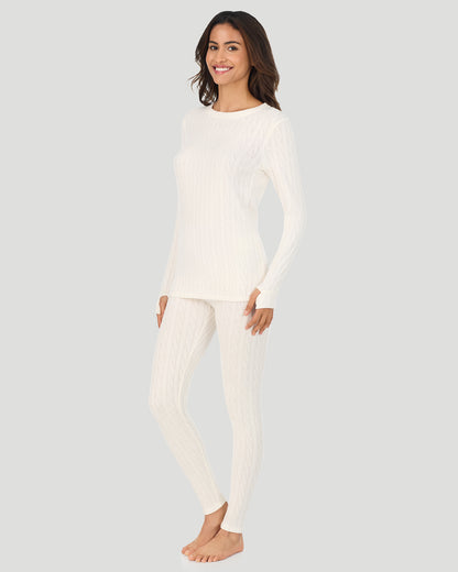 A lady wearing Vanilla Ice Cable Knit Long Sleeve Crew in a front view standing pose