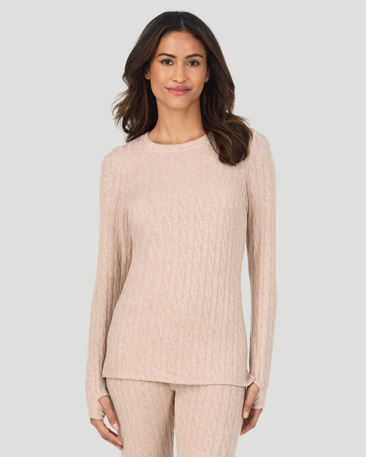 Oatmeal Heather; Model is wearing a size S. She is 5’10”, Bust 33.5”, Waist 25”, Hips 36”. @A lady wearing Oatmeal Heather Cable Knit Long Sleeve Crew in a front view pose