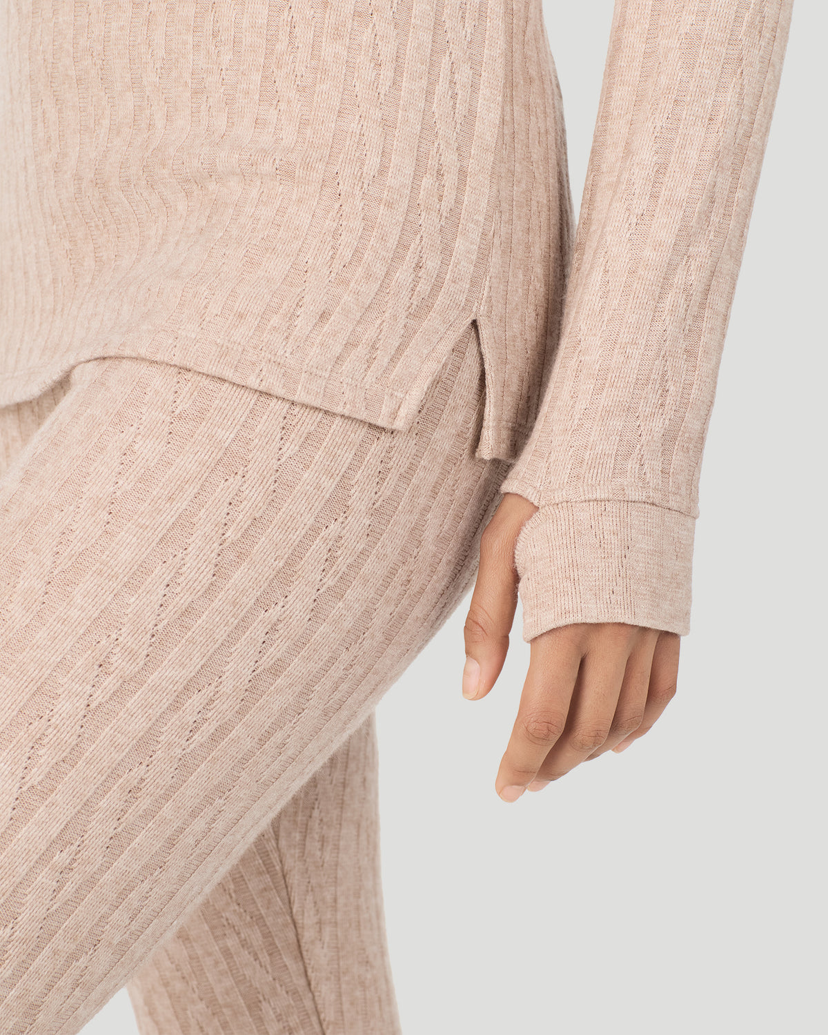 A lady wearing Oatmeal Heather Cable Knit Long Sleeve Crew in a front view detail close up look
