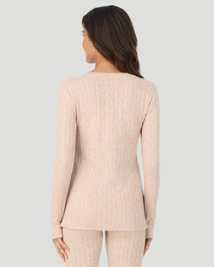 A lady wearing Oatmeal Heather Cable Knit Long Sleeve Crew in a back view pose