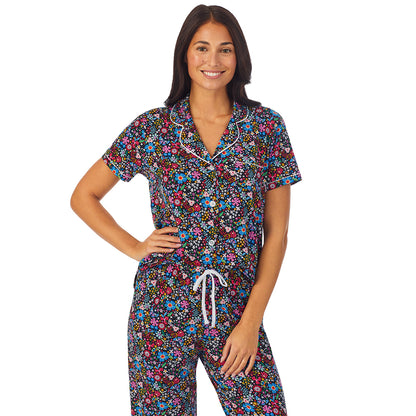 Spring Bloom;Model is wearing size S. She is 5'8.5", Bust 32", Waist 25", Hips 36". @A lady wearing Short Sleeve Notch Collar pajama set with floral print
